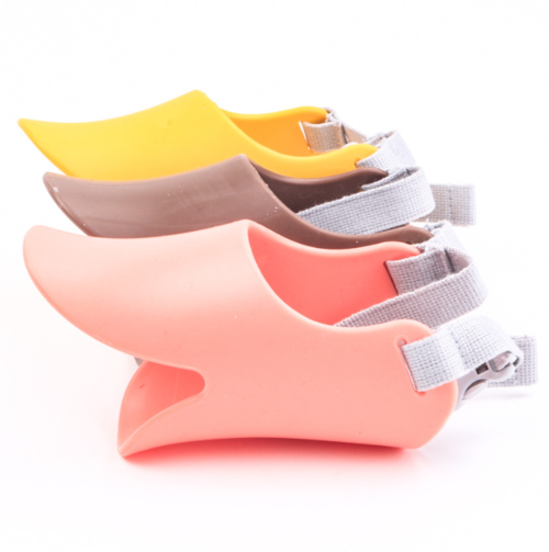 Set of colorful shoe trees with straps on a white background