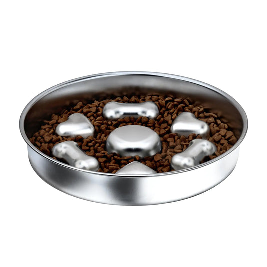 Metallic dog food bowl with raised sections on a white background