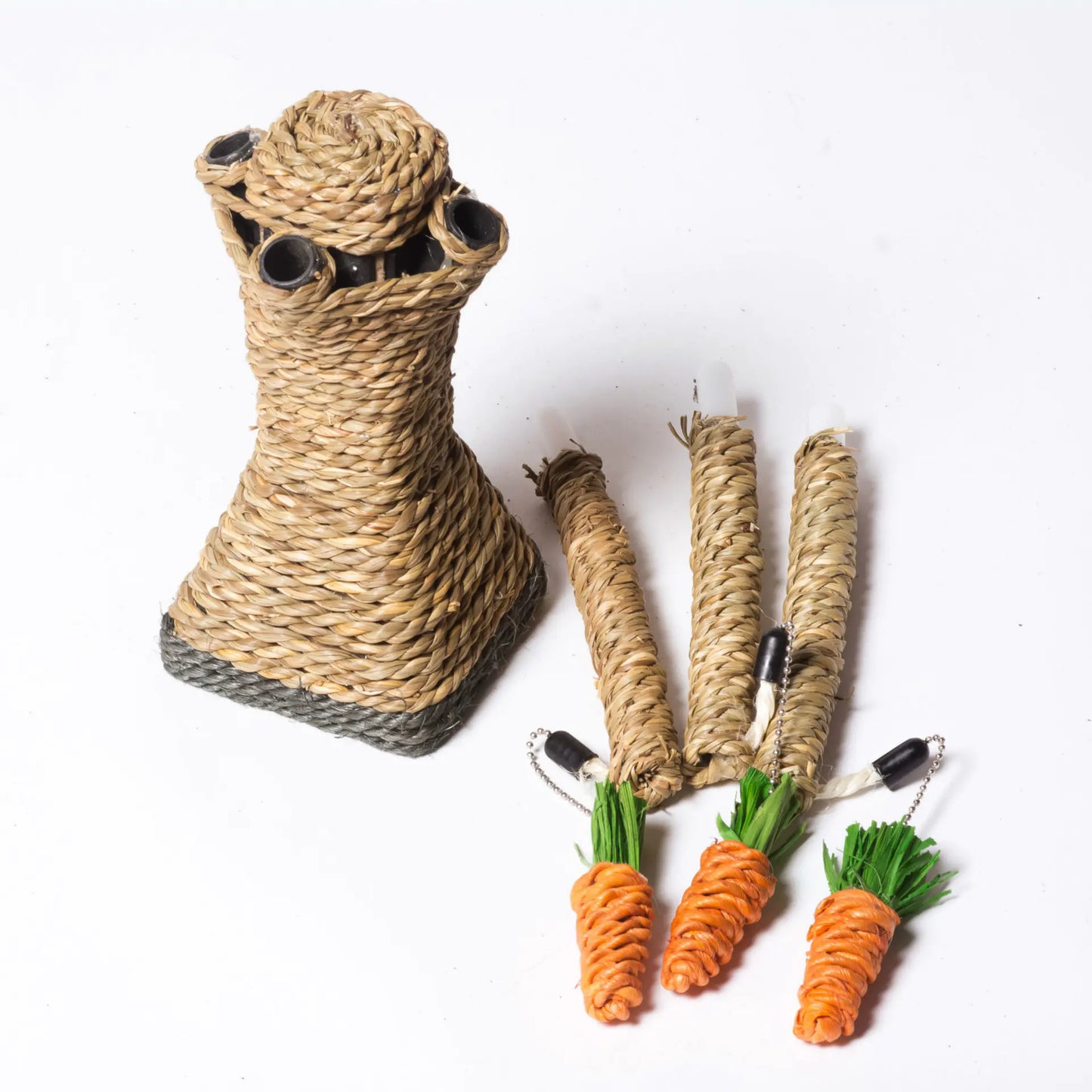 Cat toy set with sisal-wrapped scratching post and carrot-shaped catnip toys on a white background