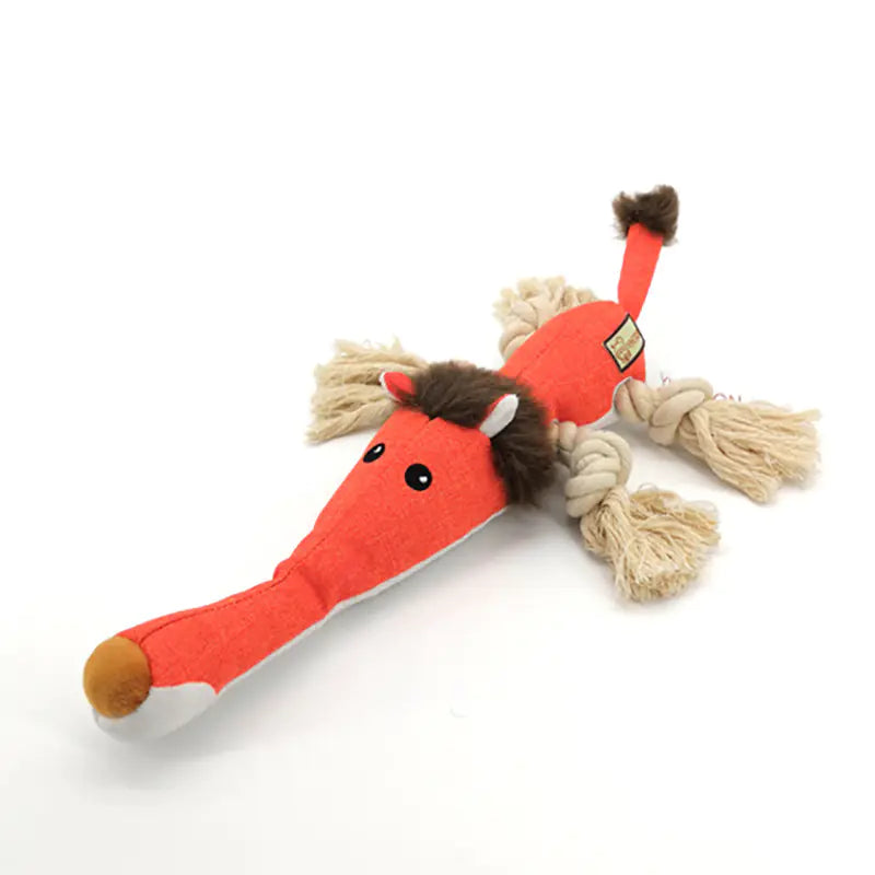 Red horse-shaped toy with braided rope on a white background