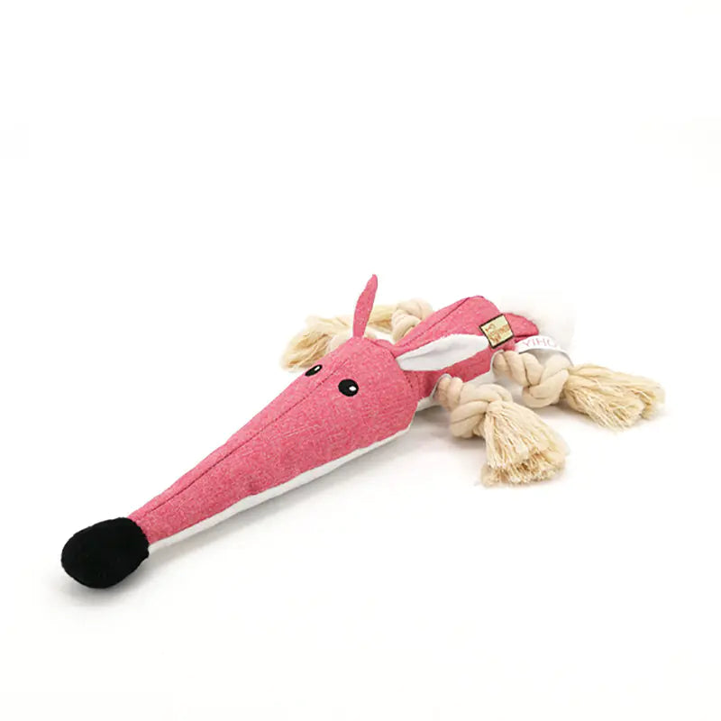 Pink dog toy shaped like a unicorn with a rope on a white background