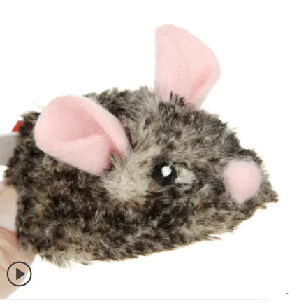 Plush toy mouse with pink ears on a white background