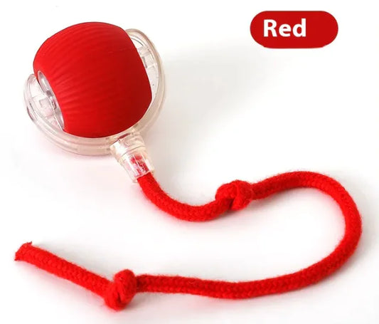 Red silicone device with a rope on a white background