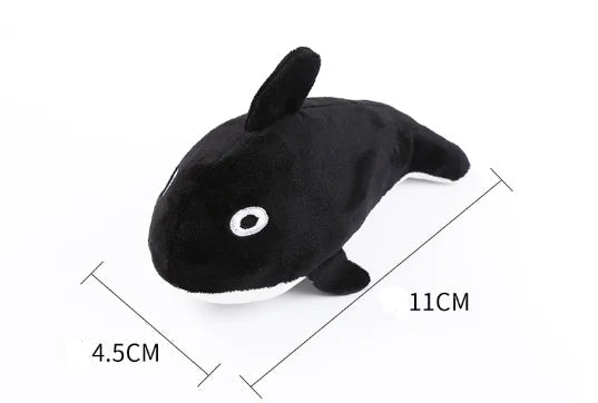 Black plush toy with measurements on a white background