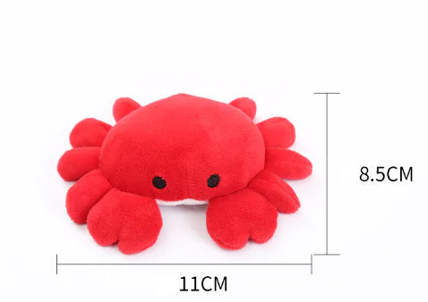 Red plush crab toy with measurements on a white background