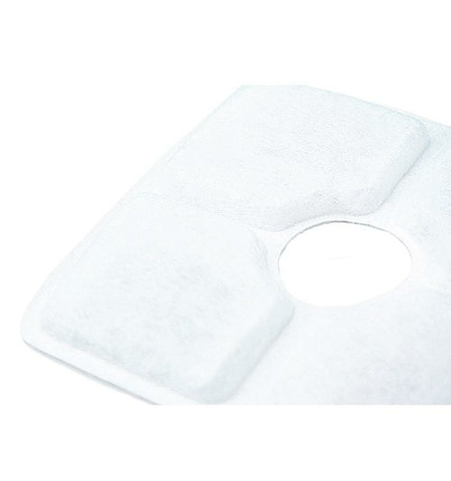 White square plate with a circular indentation on a white background