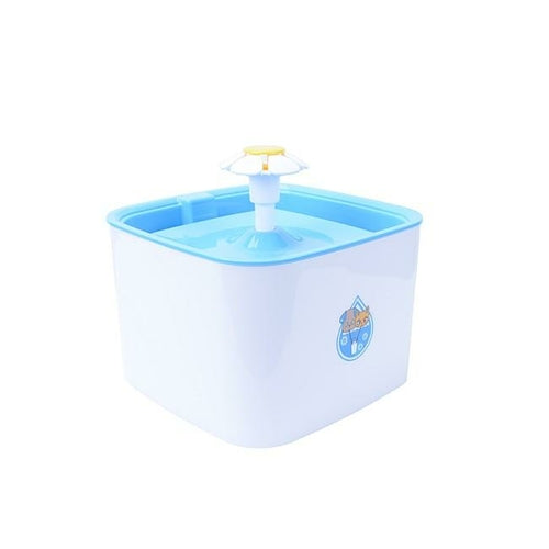 Pet water fountain with blue top and white base on a white background